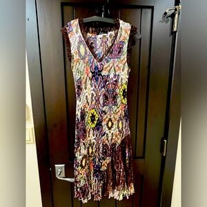 Party dress with lace and sequins.